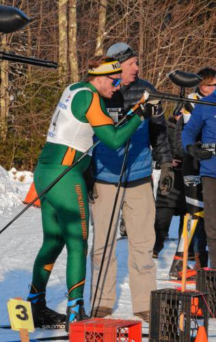 Hopkinton’s Cameron Bassett prepares to fire a shot at the target during a paintball biathlon Nordic ski race at Gunstock on Wednesday.