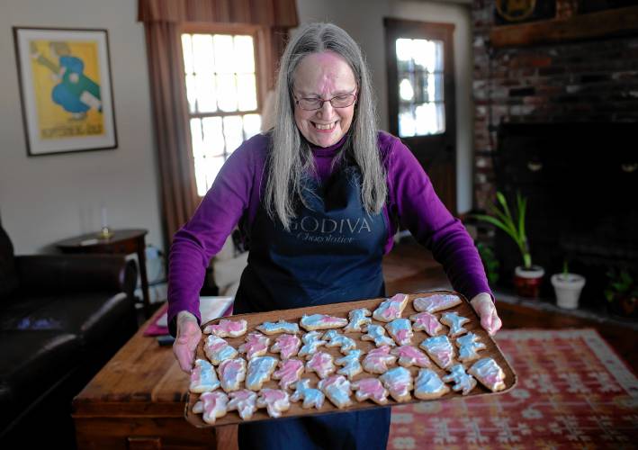 Janet DeVito holds a platter of her election cookies in her Hopkinton home on Monday, January 22.