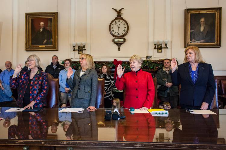 New Hampshire’s four, female Democratic electors are sworn in before casting their Electoral College ballots for Hillary Clinton at the State House in Concord, Monday, Dec. 19, 2016. (ELIZABETH FRANTZ / Monitor staff)