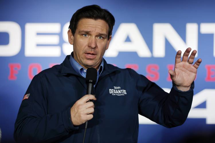 Republican presidential candidate Florida Gov. Ron DeSantis speaks during a campaign event at Wally's bar, Wednesday, Jan. 17, 2024, in Hampton, N.H. (AP Photo/Michael Dwyer)