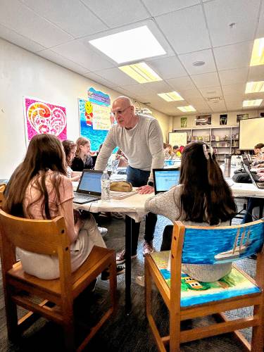 Young adult author Gordon Korman leads an adventure writing workshop with Bow Memorial School students on Tuesday, April 16.