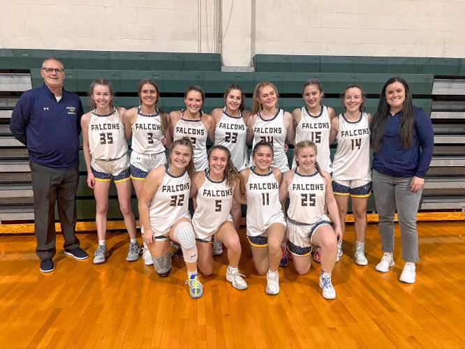 The Bow High School girls’ basketball team poses after winning the 2023 Doug Chandler Holiday Tournament at Manchester Central High School on Friday.