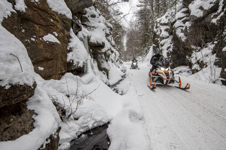 Snowmobilers pictured on the Northern Rail Trail Corridor 2 from Andover to Canaan.