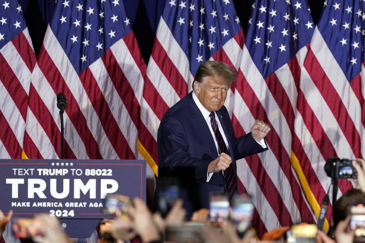 Republican presidential candidate former President Donald Trump arrives to speak at a primary election night party in Nashua, N.H., Tuesday, Jan. 23, 2024. (AP Photo/Pablo Martinez Monsivais)