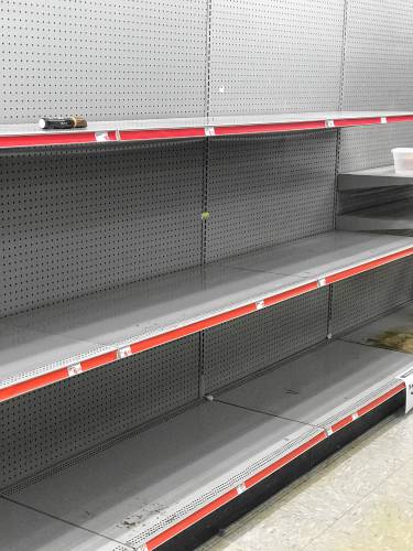 The empty shelves at the Family Dollar store on Fisherville Road on Thursday, November 16, 2023.