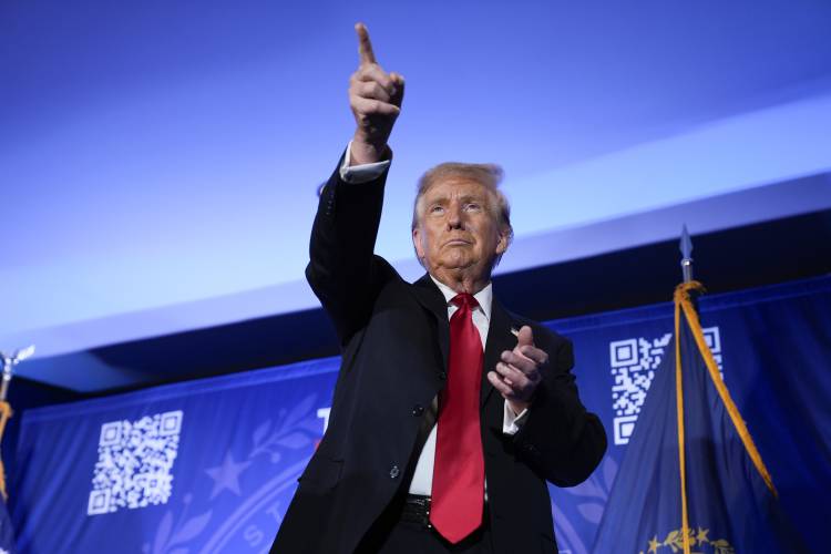 Republican presidential candidate former President Donald Trump gestures after speaking at a campaign event in Portsmouth, N.H., Wednesday, Jan. 17, 2024. (AP Photo/Matt Rourke)