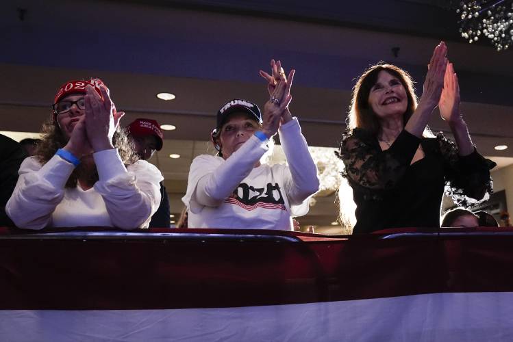 Supporters cheer as Republican presidential candidate former President Donald Trump speaks at a campaign event in Portsmouth, N.H., Wednesday, Jan. 17, 2024. (AP Photo/Matt Rourke)