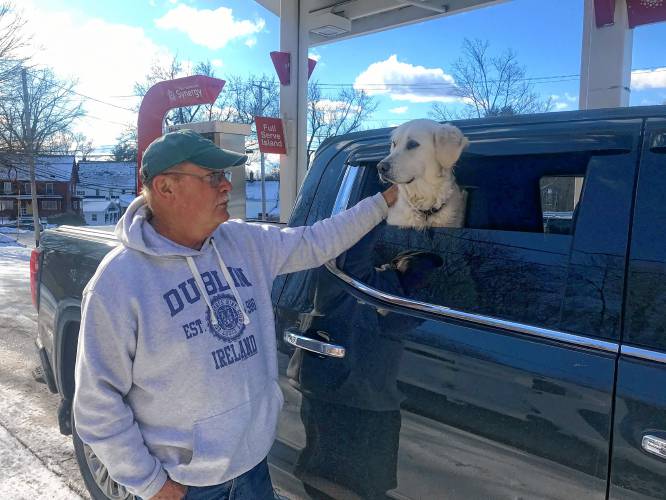 John Reardon pumps his own gas at the self-serve station in East Concord so he can spend time with the staff.