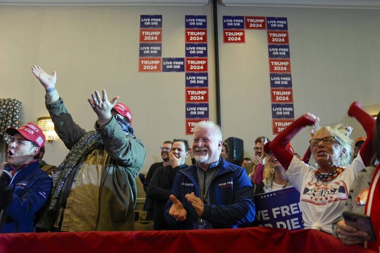 Supporters listen as Republican presidential candidate former President Donald Trump speaks at a campaign event in Concord, N.H., Friday, Jan. 19, 2024. (AP Photo/Matt Rourke)