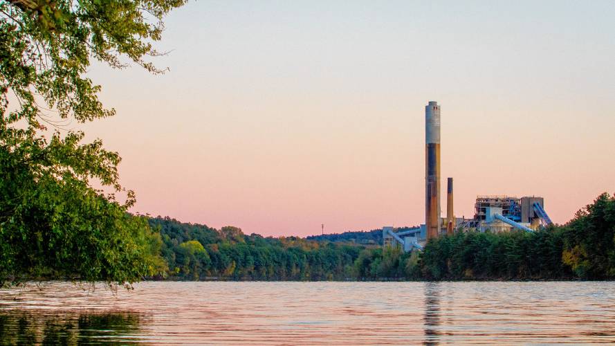The Merrimack Station power plant in Bow is seen at dusk on Thursday, Oct. 12, 2017. 