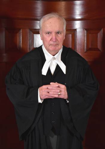 John Conlon portrays Sir Wilfred Robarts, Q.C. in Agatha Christie’s “Witness for the Prosecution.”