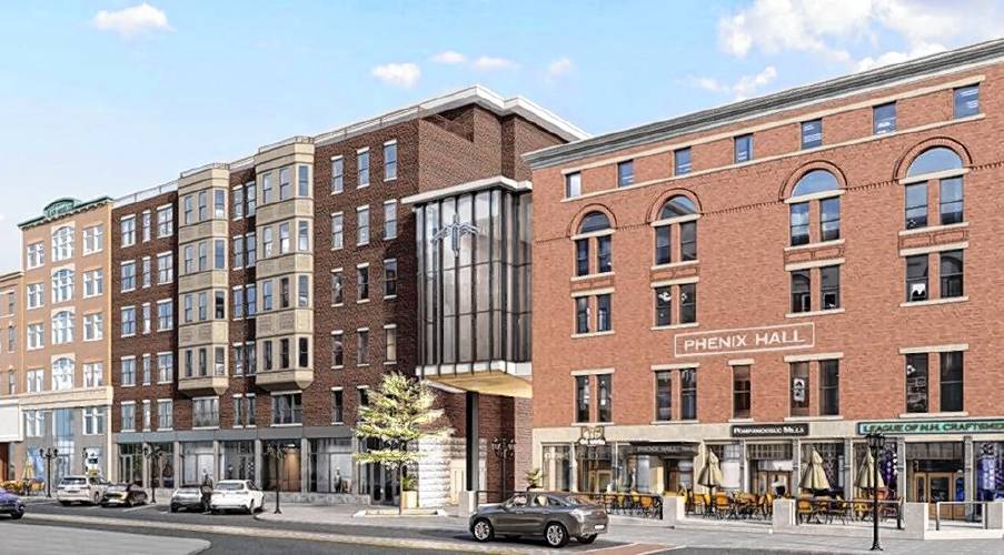 A rendering of a proposed mixed-use building to replace the closed CVS on North Main Street includes a glass-fronted connection to Phenix Hall.