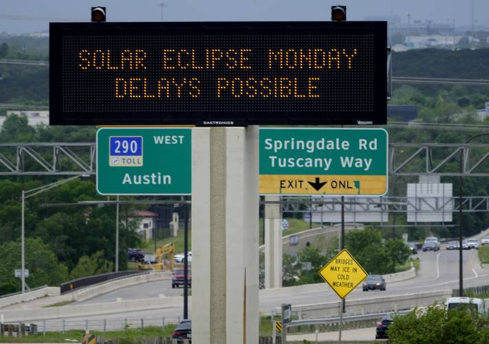 Motorists traveling toward Austin, Texas, had early reminders for expected eclipse-influenced traffic delays on Monday.