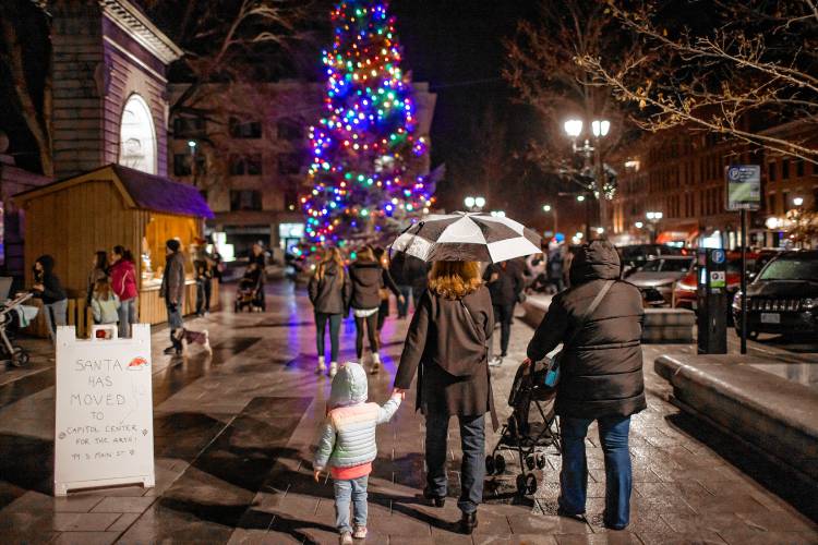 The State House Christmas tree at Midnight Merriment in downtown Concord on Dec. 1. The crowds still showed up in spite of the rain.