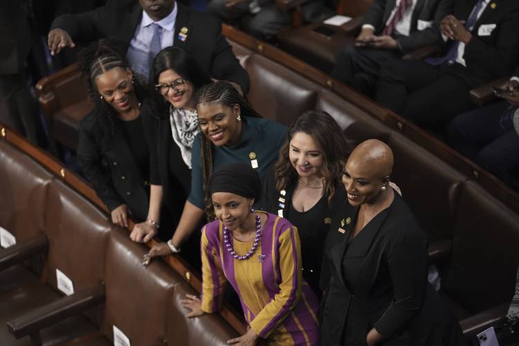 Women members of Congress, pose for photos before President Joe Biden arrives to deliver his State of the Union address to a joint session of Congress, at the Capitol in Washington, Thursday, March 7, 2024. (AP Photo/J. Scott Applewhite)