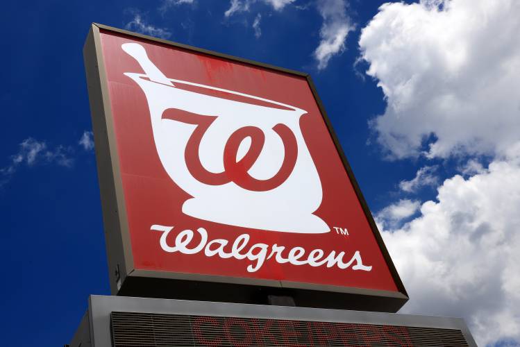 FILE - A Walgreens Pharmacy sign is seen, June 25, 2019, in Pittsburgh. Walgreens has been fined 275,000 by the state of Vermont as part of a settlement of complaints that some of national pharmacy chain's Vermont stores unexpectedly closed, had untenable working conditions for pharmacists, and made medication and vaccination errors during the coronavirus pandemic, the secretary of state announced Wednesday, Jan. 24, 2024. (AP Photo/Gene J. Puskar, File)