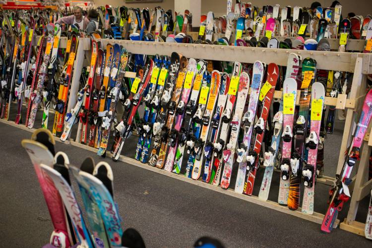 Customers browse used equipment at the Capital Ski and Outing Clubâs annual ski and skate sale at Steeplegate Mall in Concord on Saturday, Dec. 2, 2017. (ELIZABETH FRANTZ / Monitor staff)