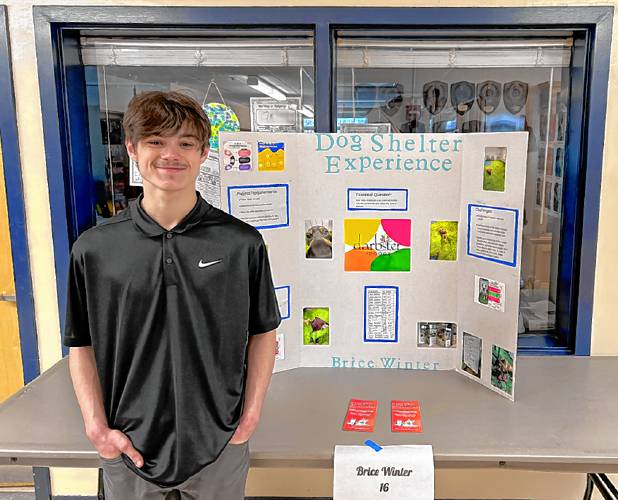 Merrimack Valley High School student Brice Winter volunteered at a dog shelter for his senior project.