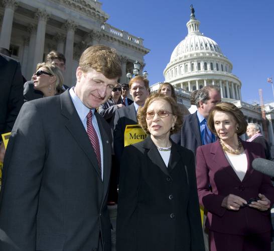 FILE - Then-Rep. Patrick Kennedy, D-R.I., left, former first lady Rosalynn Carter, center, and then-House Speaker Nancy Pelosi, D-Calif., participate in a rally to discuss the bipartisan mental health parity legislation, March 5, 2008, on Capitol Hill in Washington. Health care experts say the advocacy of Carter, who died Sunday, Nov. 19, 2023, at age 96, created a framework for much of the progress on mental illness in America. (AP Photo/Manuel Balce Ceneta, File)