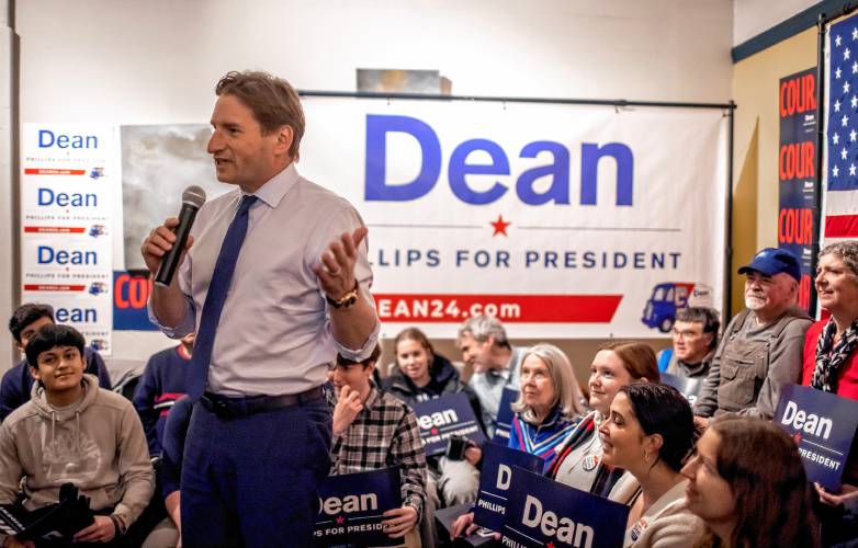  Dean Phillips, a U.S. Congressman from Minnesota, speaks to a crowd of supporters at the Brother’s Cortado in Concord on Friday night.