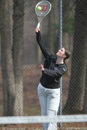 Coe-Brown’s No. 3 Stella Vachon, a senior, serves during her singles to beat Pembroke’s Lily Russell, 8-2.