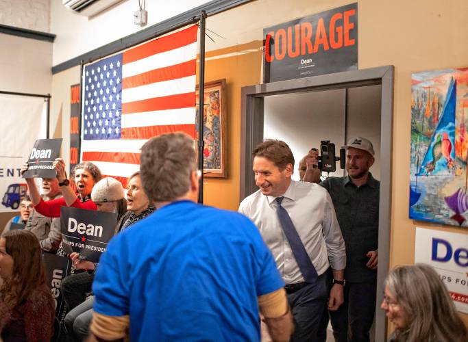 Dean Phillips, a U.S. Congressman from Minnesota, is introduced to a crowd of supporters at the Brother’s Cortado coffee shop in Concord on Friday night. In the audience was a group of students from Temple University.