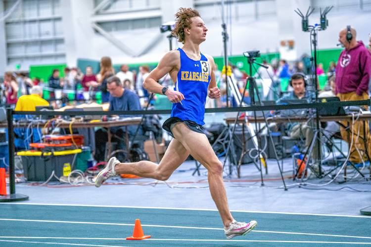 Kearsarge’s Daniel Dalbec races to victory in the 1,500 meters at the NHIAA Division II indoor track and field championship on Saturday at Plymouth State University. Dalbec took an early lead and held on for the title.