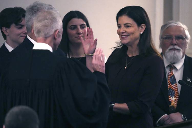 Republican Kelly Ayotte, a former U.S. senator who succeeds fellow Republican Chris Sununu, in sworn in during her inauguration at the State House, Thursday, Jan. 9, 2025, in Concord. Republican Kelly Ayotte, a former U.S. senator who succeeds fellow Republican Chris Sununu, in sworn in during her inauguration at the State House, Thursday, Jan. 9, 2025, in Concord.