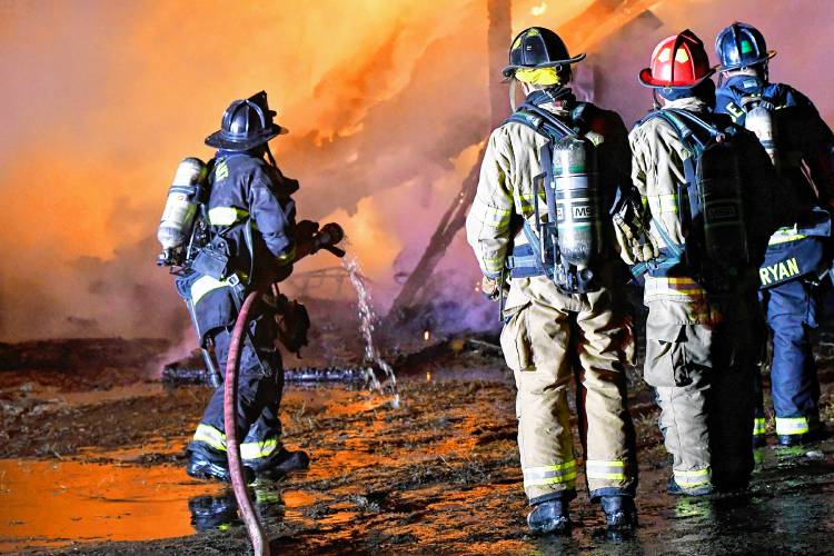 Friefighters battle a barn fire at 357 Shaker Road in Canterbury early Tuesday morning, February 5, 2025. There were no injuries and no animals were in the barn.The cause of the fire is currently under investigation.Due to the remote location, water had to be shuttled in from a pond two miles away.Canterbury crews were assisted by Loudon fire, Belmont fire, Laconia fire,Penacook Rescue, Tilton-Northfield fire and Epsom fire.