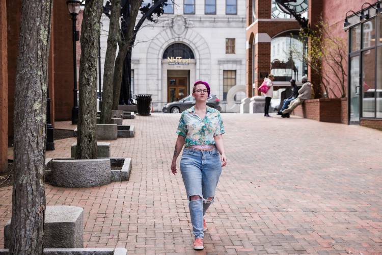  Sierra Hubbard walks down Eagle Square in downtown Concord, a place where she would meet clients when she was supportive housing program manager at the Concord Coalition to End Homelessness