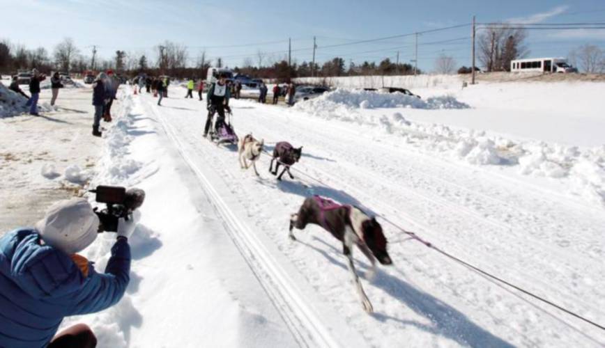 Ed Clifford of Raymond takes off with his team during the six-dog classic at the Laconia World Championship Sled Dog Derby in 2022. 