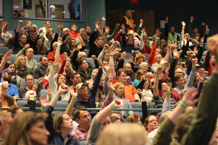 Bow residents vote in favor of amending the Bow Budget Committee's recommended operating budget for the school district by over 750,000 during the Bow School District's town meeting Friday night. Bow residents vote in favor of amending the Bow Budget Committee's recommended operating budget for the school district by over 750,000 during the Bow School District's town meeting Friday night.