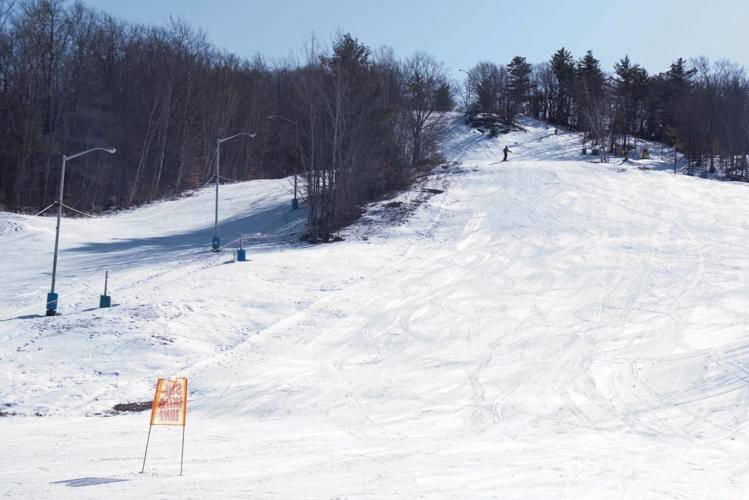 Skiers take to the slopes at the Veterans Memorial Ski Area in Franklin on Sunday afternoon. With a recent snowfall Thursday, and the new addition of a snow cannon, the ski area had enough snow to reopen for the weekend.