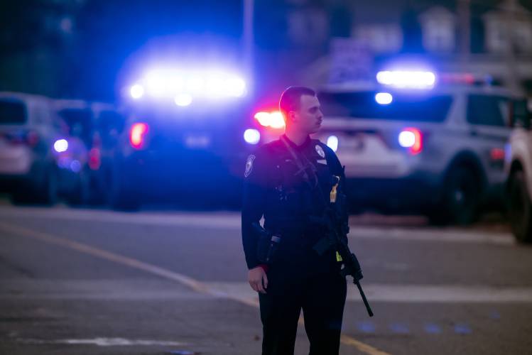 Police work at the scene of a shooting at New Hampshire Hospital Friday, Nov. 17, 2023. 