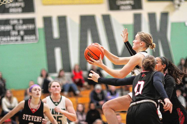 Hopkinton senior Lizz Holmes prepares to attempt a layup during a win over Stevens on Jan. 19. Hopkinton senior Lizz Holmes prepares to attempt a layup during a win over Stevens on Jan. 19.