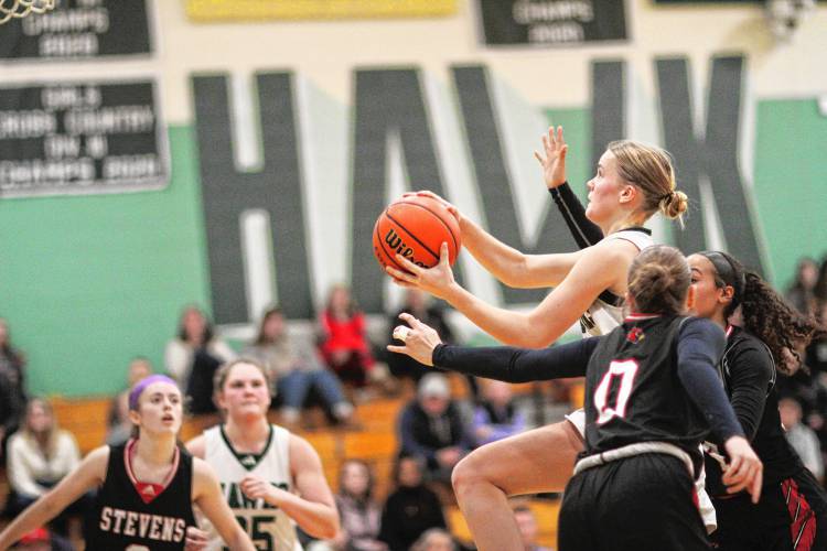 Hopkinton senior Lizz Holmes prepares to attempt a layup during a win over Stevens on Jan. 19.