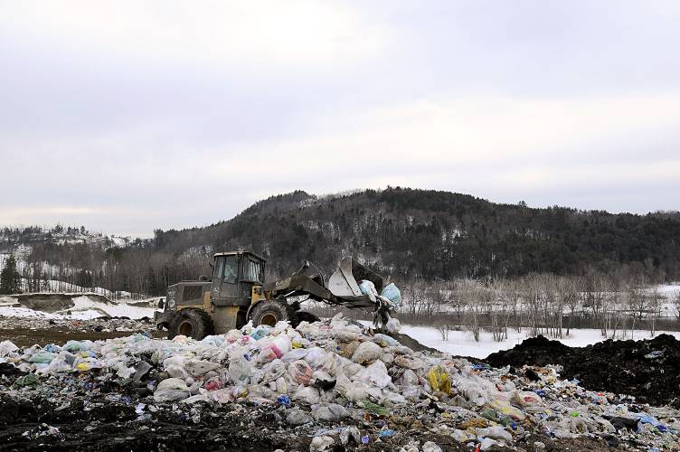 A loader moves  garbage at the landfill in West Lebanon, N.H., on Feb. 16, 2011.