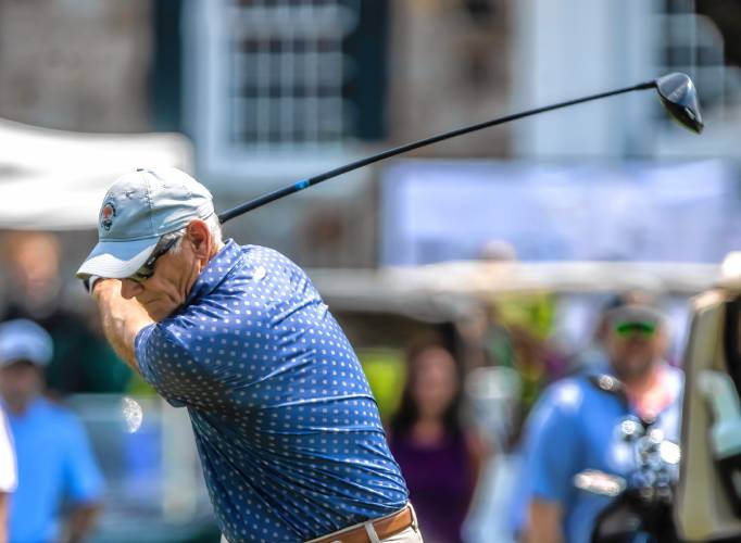 David Perry tees off at the first hole at Concord Country Club in the second round of the 121st State Amateur Championship on Tuesday. Perry made the cut to advance to match play on his home course