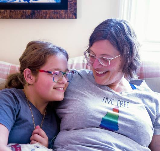 Iris Turmelle and her mother, Amy Manzelli, in their Pembroke home.