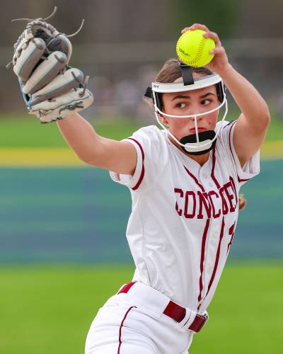 Concord’s Natalee Rowell winds up to deliver a pitch during a game against Nashua South at Memorial Field on Friday. Rowell pitched a one-hitter to help Concord beat Nashua South, 11-1, to earn her first varsity win in the circle.