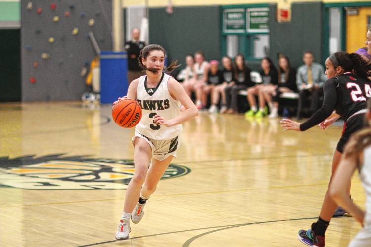 Hopkinton junior Shaylee Murdough drives to the basket during Friday night’s game over Stevens. Murdough led the Hawks with 16 points.