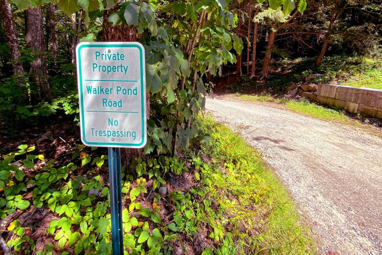 The entrance of Walker Pond Road in Webster where town treasurer Bruce Johnson bought land across from his residence.