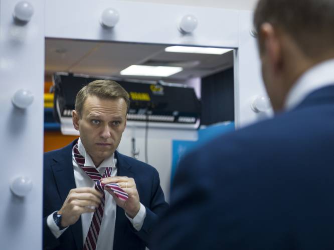 FILE - Russian opposition politician Alexei Navalny prepares himself prior his interview with The Associated Press in Moscow, Russia on Dec. 18, 2017. Alexei Navalny, the fiercest foe of Russian President Vladimir Putin who crusaded against official corruption and staged massive anti-Kremlin protests, died in prison Friday Feb. 16, 2024 Russia’s prison agency said. He was 47. (AP Photo/Alexander Zemlianichenko, File)