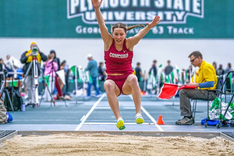 Concord’s Ella Goulas takes flight in the long jump at the NHIAA Division I indoor track and field championships on Saturday at Plymouth State University. Goulas won the event with a leap of 17 feet, 8.75 inches.