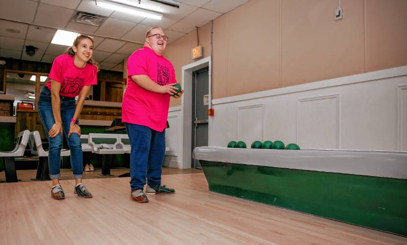 Cheyenne Boucher and Owen Sansoucie have a bowling night at Boutwell’s in Concord earlier this month. 