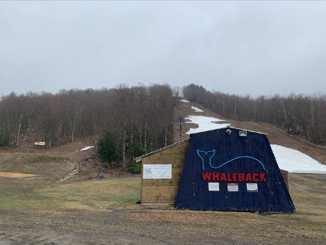 The snow that remained at Whaleback in mid-April was made by the ski area. (Beatrice Burack | New Hampshire Bulletin)