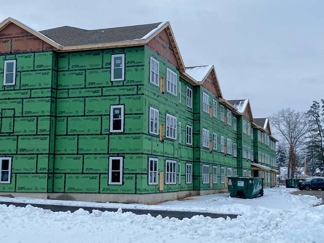 The new apartments at 195, 197, and 199 Pembroke Road in Concord are currently under construction.