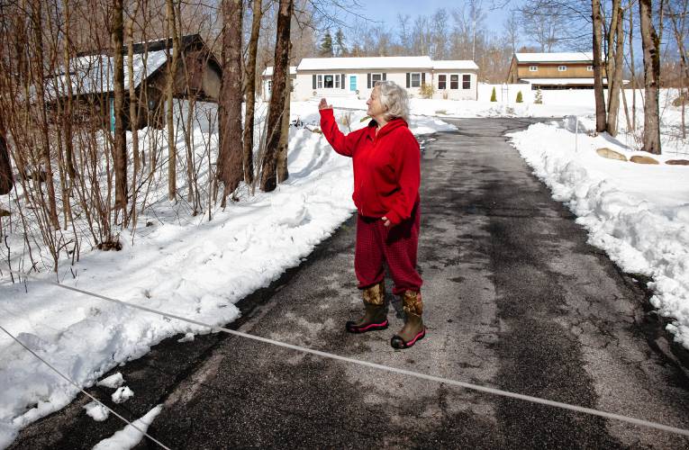 The tree branches that knocked down the wires onto Brenda Payneâs driveway on East Penacook Road in Hopkinton on Monday, March 25, 2024. Payne has been stuck in her home with her grandson since Saturday. She has a generator but has not been able to go into work and has called Eversource five times.