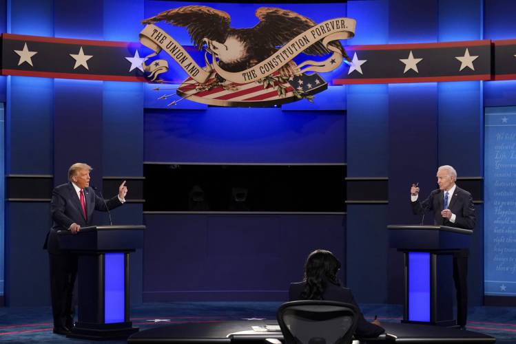 President Donald Trump, left, and Democratic presidential candidate former Vice President Joe Biden speak during the debate in Nashville, Tenn. on Oct. 22, 2020. President Donald Trump, left, and Democratic presidential candidate former Vice President Joe Biden speak during the debate in Nashville, Tenn. on Oct. 22, 2020.