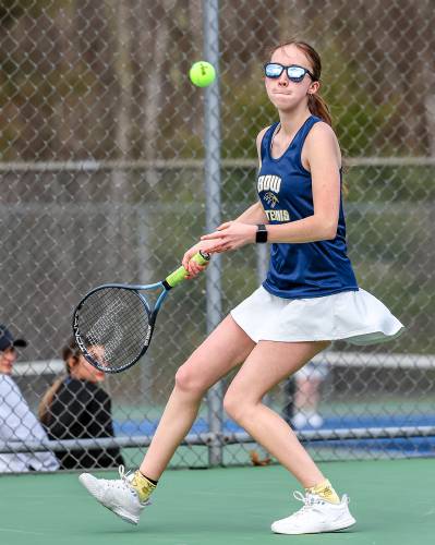 Bow’s Makaylie Laws returns a shot during a match against Kennett on Thursday. Laws won her singles match and partnered with Maddy Desrosiers to win the deciding doubles match, lifting the Falcons to a 5-4 victory. Bow’s Makaylie Laws returns a shot during a match against Kennett on Thursday. Laws won her singles match and partnered with Maddy Desrosiers to win the deciding doubles match, lifting the Falcons to a 5-4 victory.